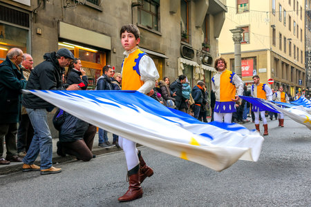 Florence, Italy - January 6, 2013: Flag throwing and waving parade as part of Epiphany day, the...