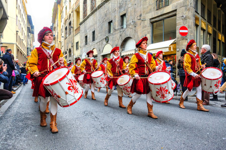 Florence, Italy - January 6, 2013: Marching band drummers in the Epiphany Day parade, the feast of Christian holidays and churches celebrate with a grand procession in medieval costumes.のeditorial素材