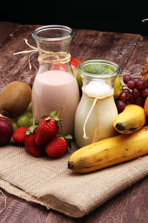 healthy food - Strawberry Banana smoothie or milkshake, nectarines, kiwi,の写真素材