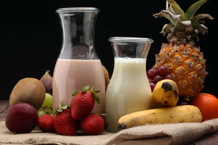 healthy food - Strawberry Banana smoothie or milkshake, nectarines, kiwi,の写真素材