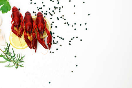 tasty boiled crawfish closeup on table, seafood dinner seasonの写真素材