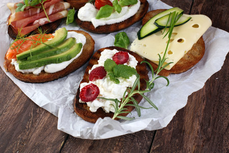 Bread Brushetta or authentic traditional spanish tapas set for lunch table. Sharing antipasti on...