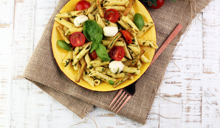 Traditional Italian penne pasta, fresh mozzarella, fresh tomato and sun dried tomato meal
