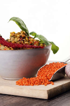 Lentil curry salad with carrot, cauliflower, broccoli and onion in a bowl. Healthy lifestyle. Diet menuの写真素材