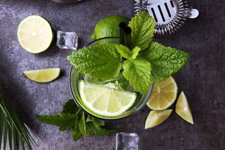 Mojito cocktail with lime and mint in highball glassの写真素材