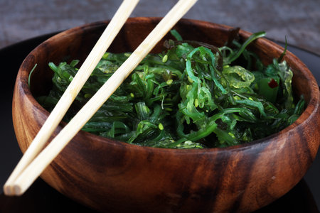 Hiyashi Wakame Chuka or seaweed salad on table, Japanese food