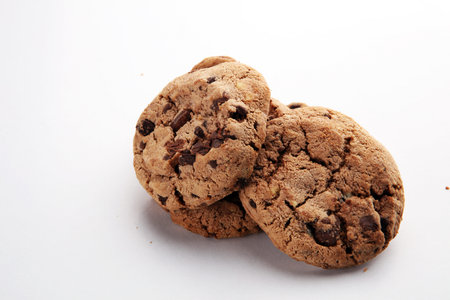 Chocolate chip cookie on white, homemade bakery concept