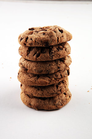 Chocolate chip cookie on white, homemade bakery conceptの写真素材