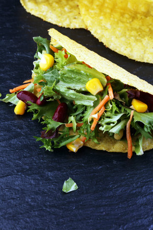 three mexican salat carnitas tacos