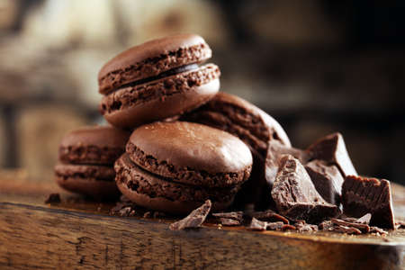 macarons sweet chocolate macaron French on wooden tableの写真素材