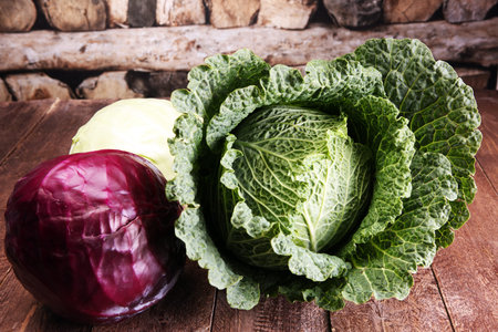 Three fresh organic cabbage heads. Antioxidant balanced diet eating with red cabbage, white cabbage...