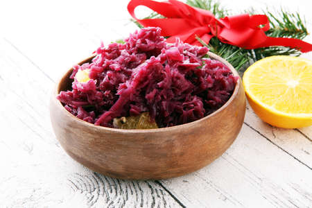 Red Cabbage salad with orange and pecan nuts for Christmas dinner. Vegetarian dishの写真素材