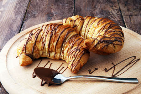 Fresh homemade croissants with chocolate. Sweet bakery concept.の写真素材