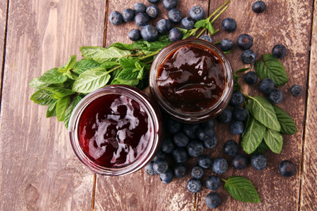 Fresh blueberry jam with toast or bread for breakfast.