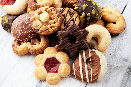tasty fresh Christmas cookies on  white wooden table