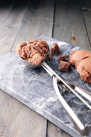Chocolate ice cream scoop, scooped with a ice spoonの写真素材