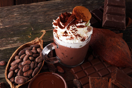 Hot chocolate or coffee with whipped cream in glass