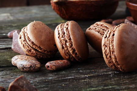 Sweet and colourful french macaroons or macaron on wooden background, Dessertの写真素材