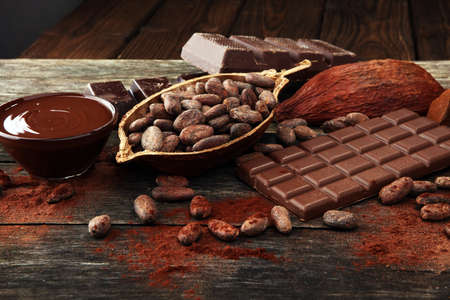 Melting chocolate or melted chocolate and chocolate swirl. stack and powderの写真素材