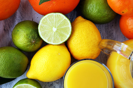 Citrus background. Assorted fresh citrus fruit. Lemon, orange lime, grapefruit. Fresh and colorful...
