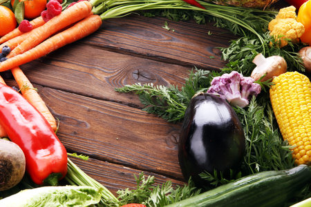 Composition with variety of raw organic vegetables and fruits. Balanced diet