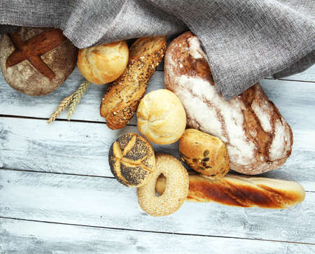 Different kinds of bread and bread rolls. Kitchen or bakery poster designの写真素材