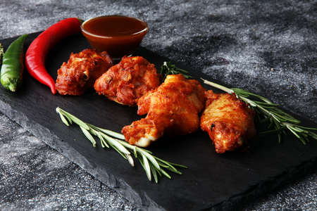 crispy barbecue chicken wings bbq on grey backgroundの写真素材
