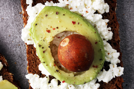 Sliced avocado on toast bread with spices