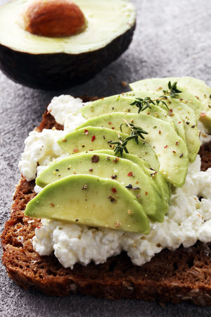 sliced avocado on toast bread with spices