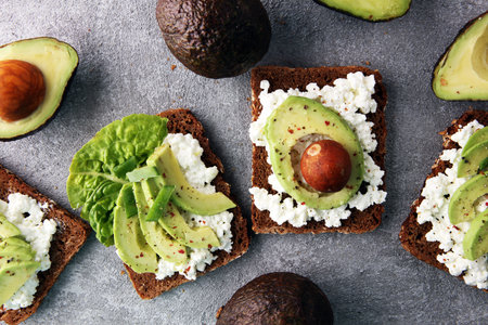 sliced avocado on toast bread with spices