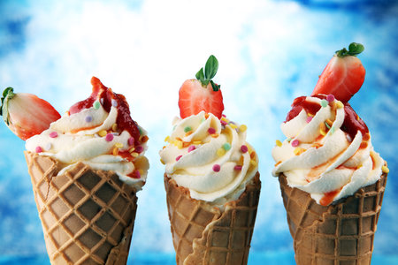 Vanilla frozen yogurt or soft ice cream in waffle cone