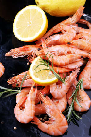 Raw fresh Prawns Langostino Austral. shrimp seafood with lemon and spicesの写真素材