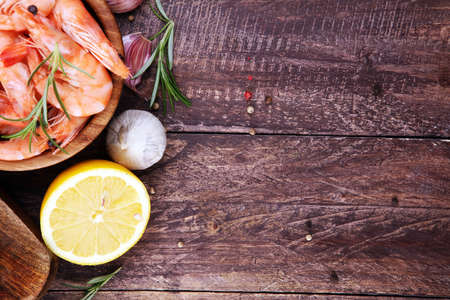 Raw fresh Prawns Langostino Austral. shrimp seafood with lemon and spicesの写真素材