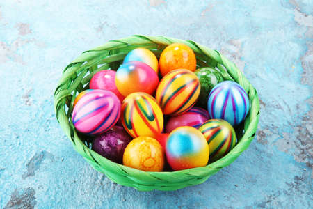 Row of Easter eggs on blue background. easter decorationの写真素材