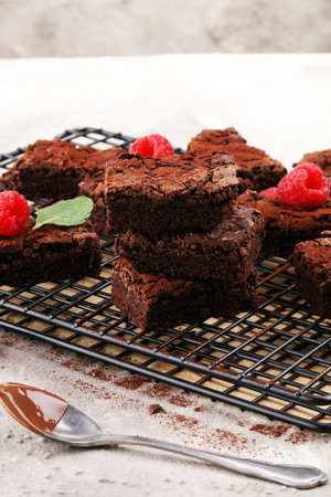 homemade chocolate brownies on rustic table. brownie bakeryの写真素材