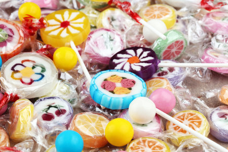 candies with jelly and sugar. colorful array of different childs sweets and treats