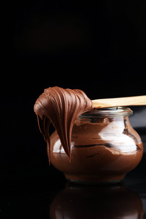 Homemade hazelnut spread in bowl. Hazelnut Nougat cream.