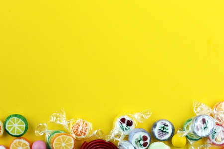 candies with jelly and sugar. colorful array of different childs sweets and treatsの写真素材