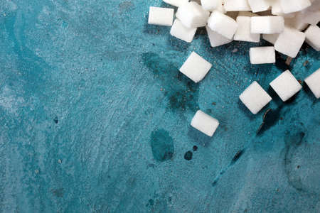sugar cubes. unhealthy living with white crystal sugar cubeの写真素材