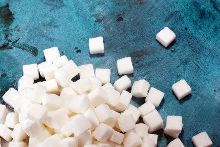 sugar cubes. unhealthy living with white crystal sugar cubeの写真素材