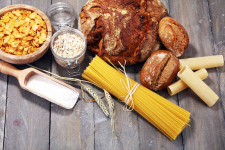whole grain products with complex carbohydrates on rustic backgroundの写真素材