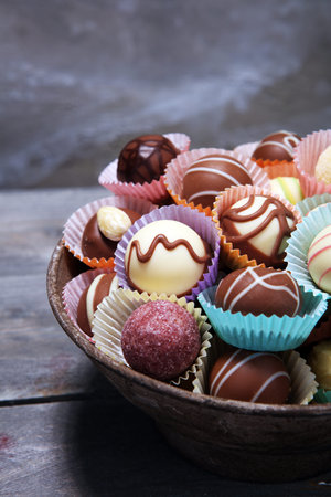 a lot of variety chocolate pralines, belgian confectionery gourmet chocolate