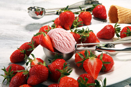 Delicious strawberry ice cream and waffle with fresh strawberriesの写真素材