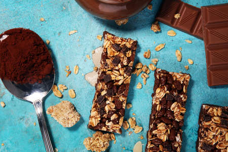 Granola bar. Healthy sweet dessert snack. Cereal granola bar with nuts and chocolateの写真素材