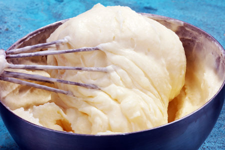 close up of a white whipped or sour cream in bowl