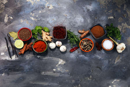 Spices and herbs on table. Food and cuisine ingredientsの写真素材