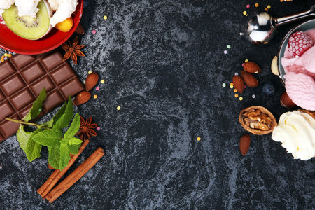 Vanilla frozen yogurt or soft ice cream in waffle cone in various flavour and strawberry icecreamの写真素材