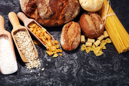 whole grain products with complex carbohydrates on rustic backgroundの写真素材