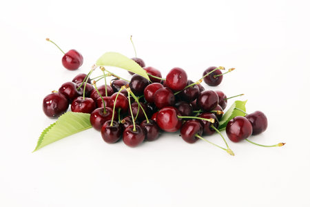 Cherry. Red fresh bunch of cherries on the table.