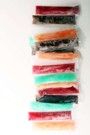 Colorful frozen fruit bar ice pops.の写真素材